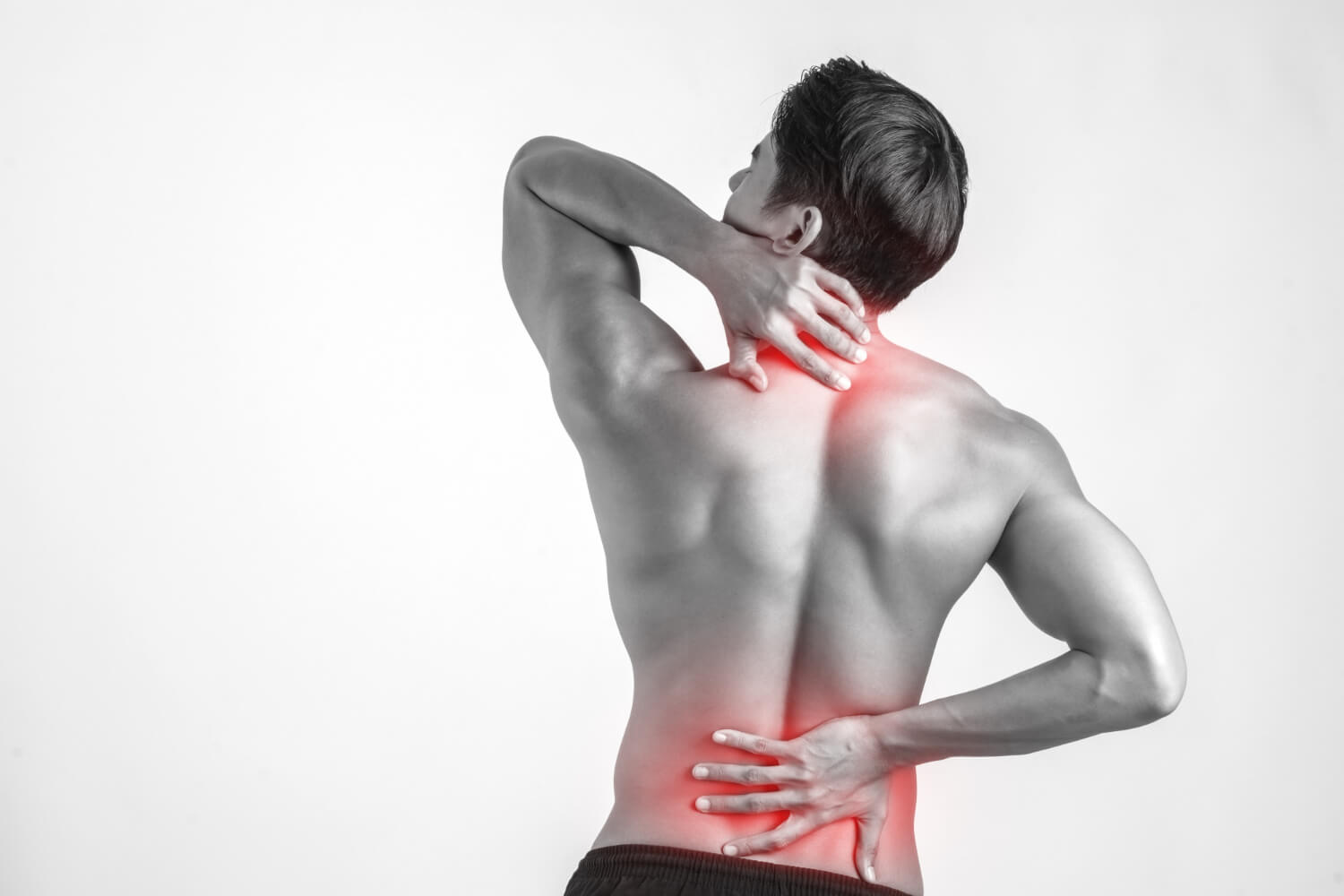 close up man rubbing his painful back isolated white background - Pain Management